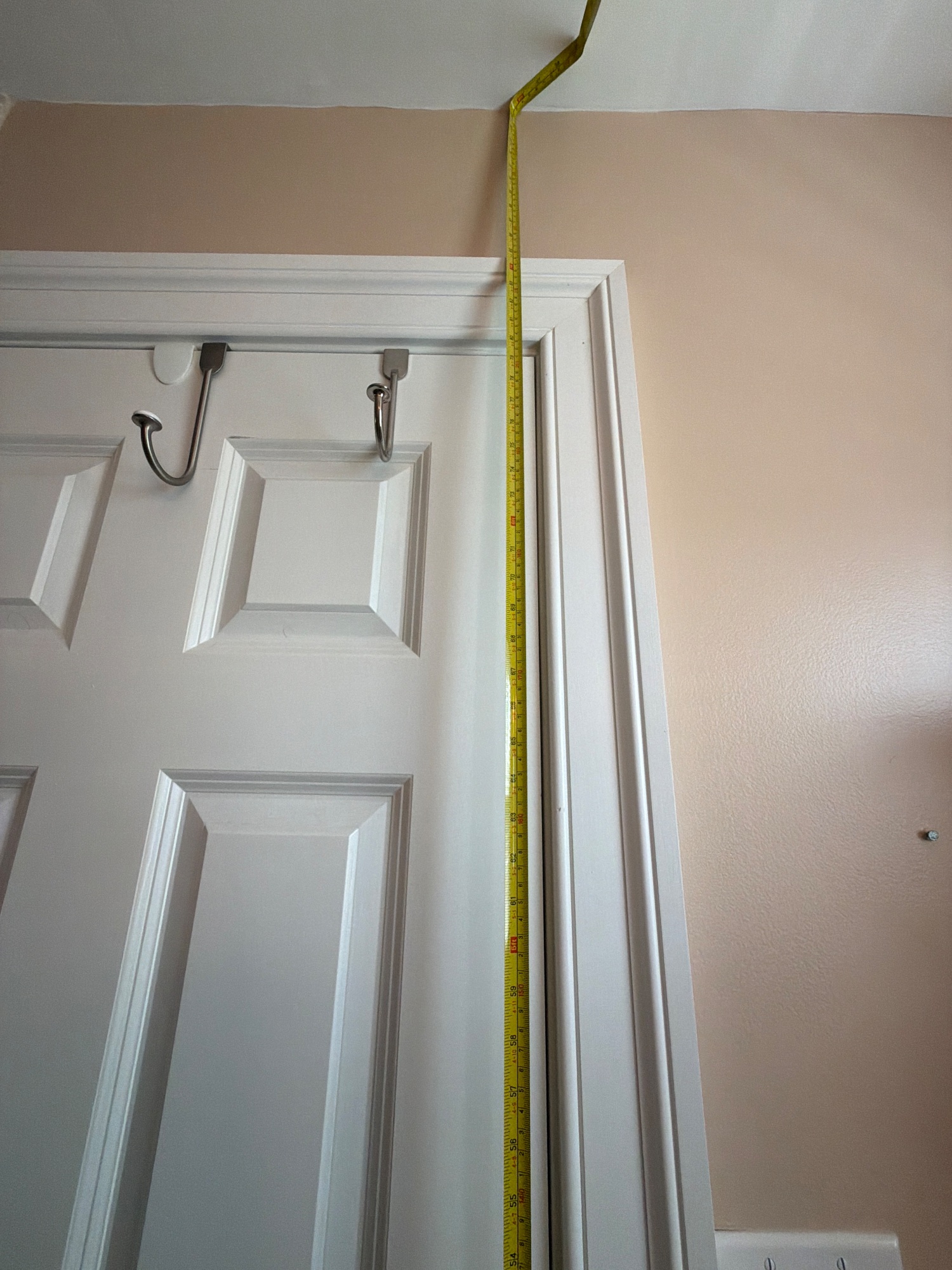 Tape in place: Floor to ceiling