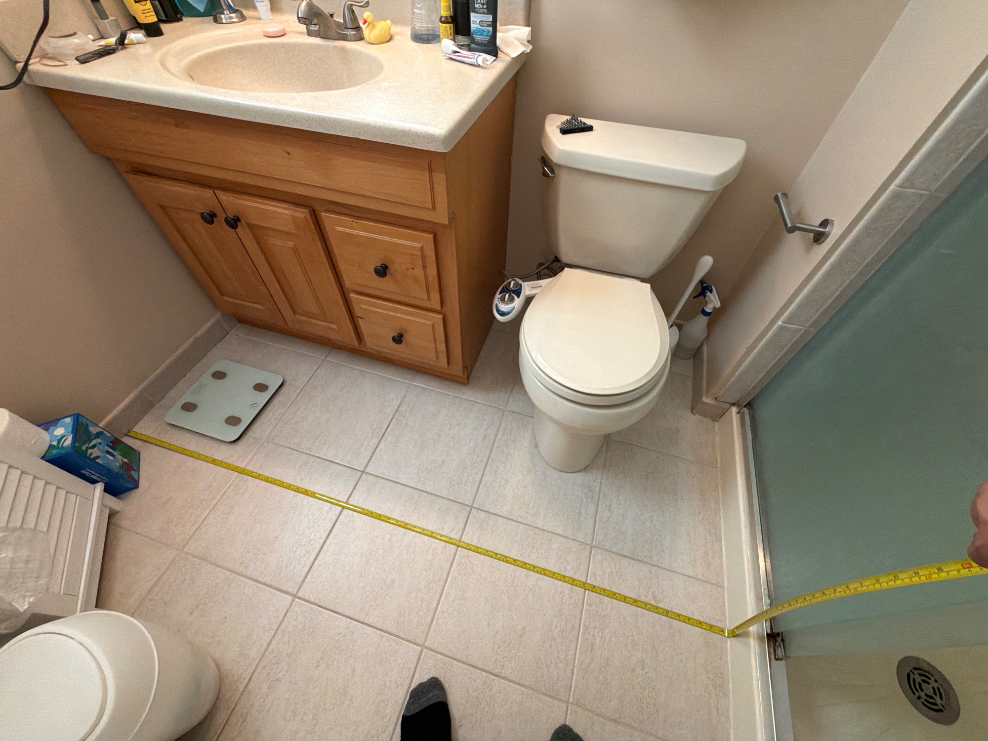 Tape in place: Room, wall to wall at the floor — the long way