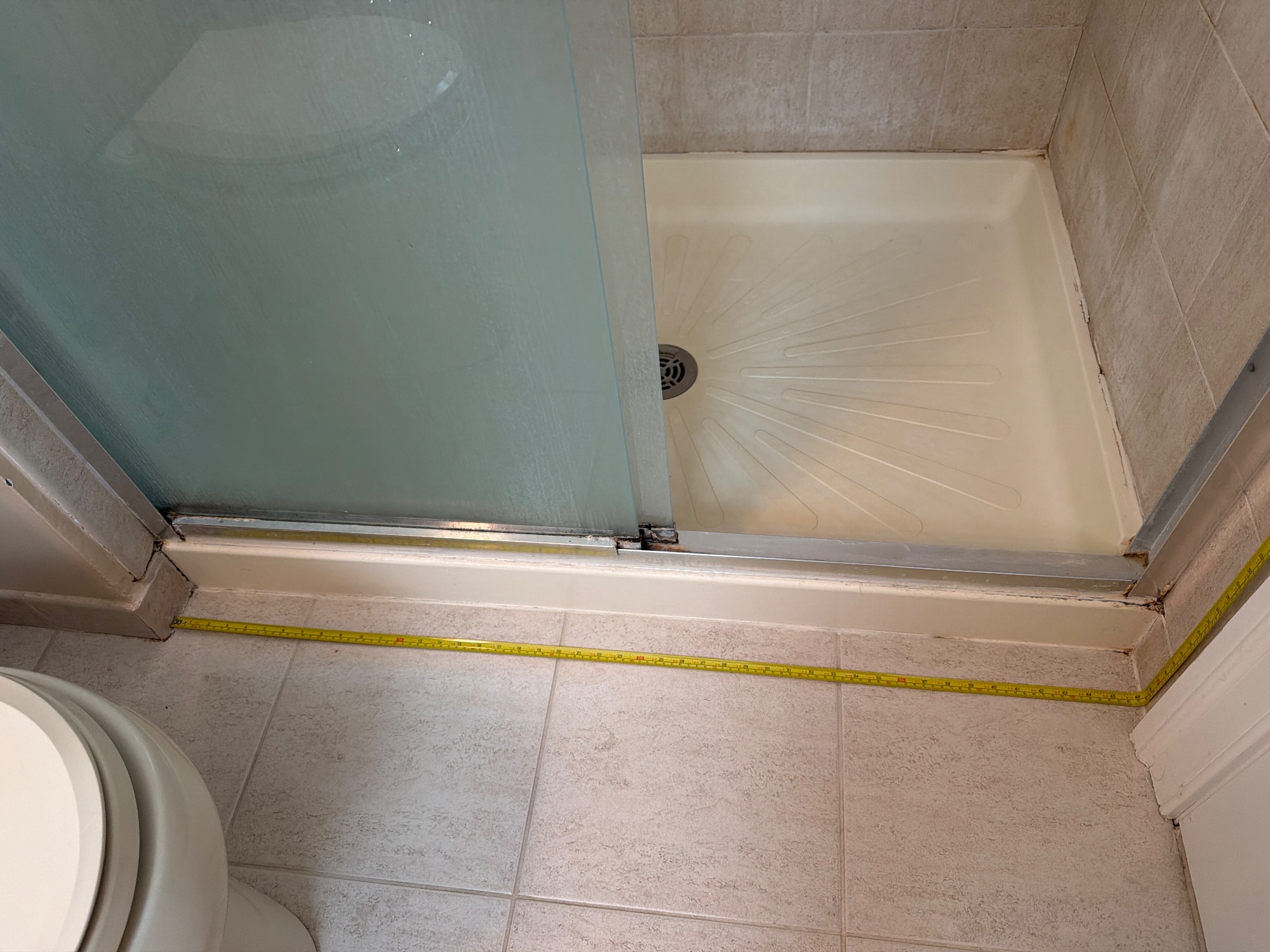 Tape in place: Tub or shower, the long way