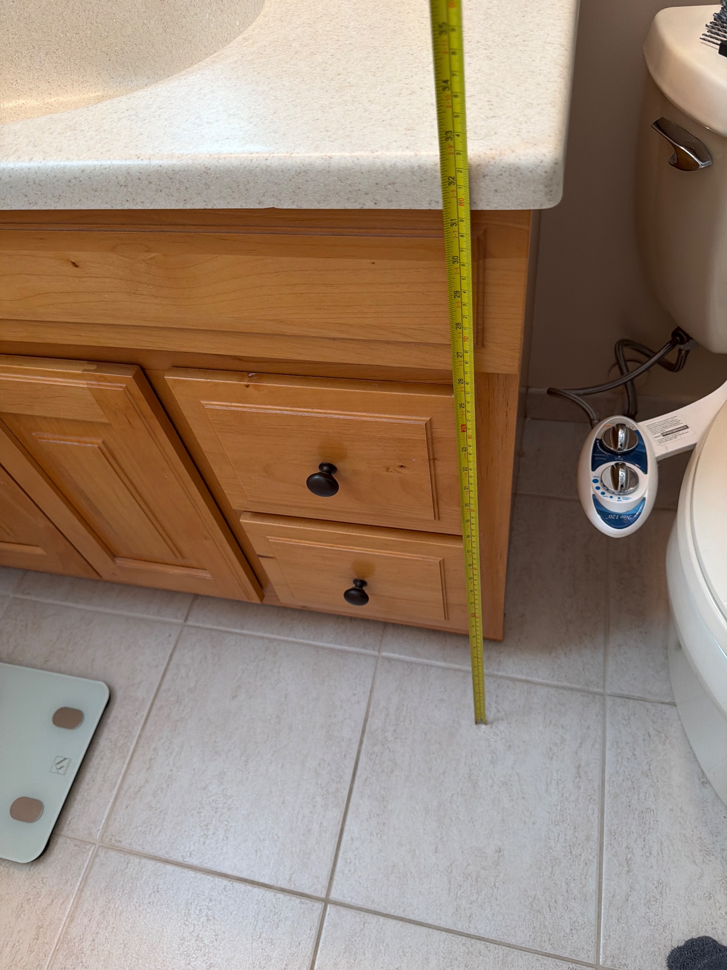 Tape in place: Floor to the top of the vanity