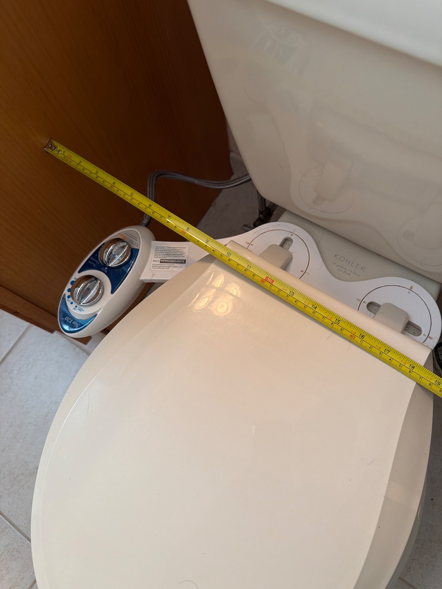 Tape in place: Vanity edge across to the center of the toilet