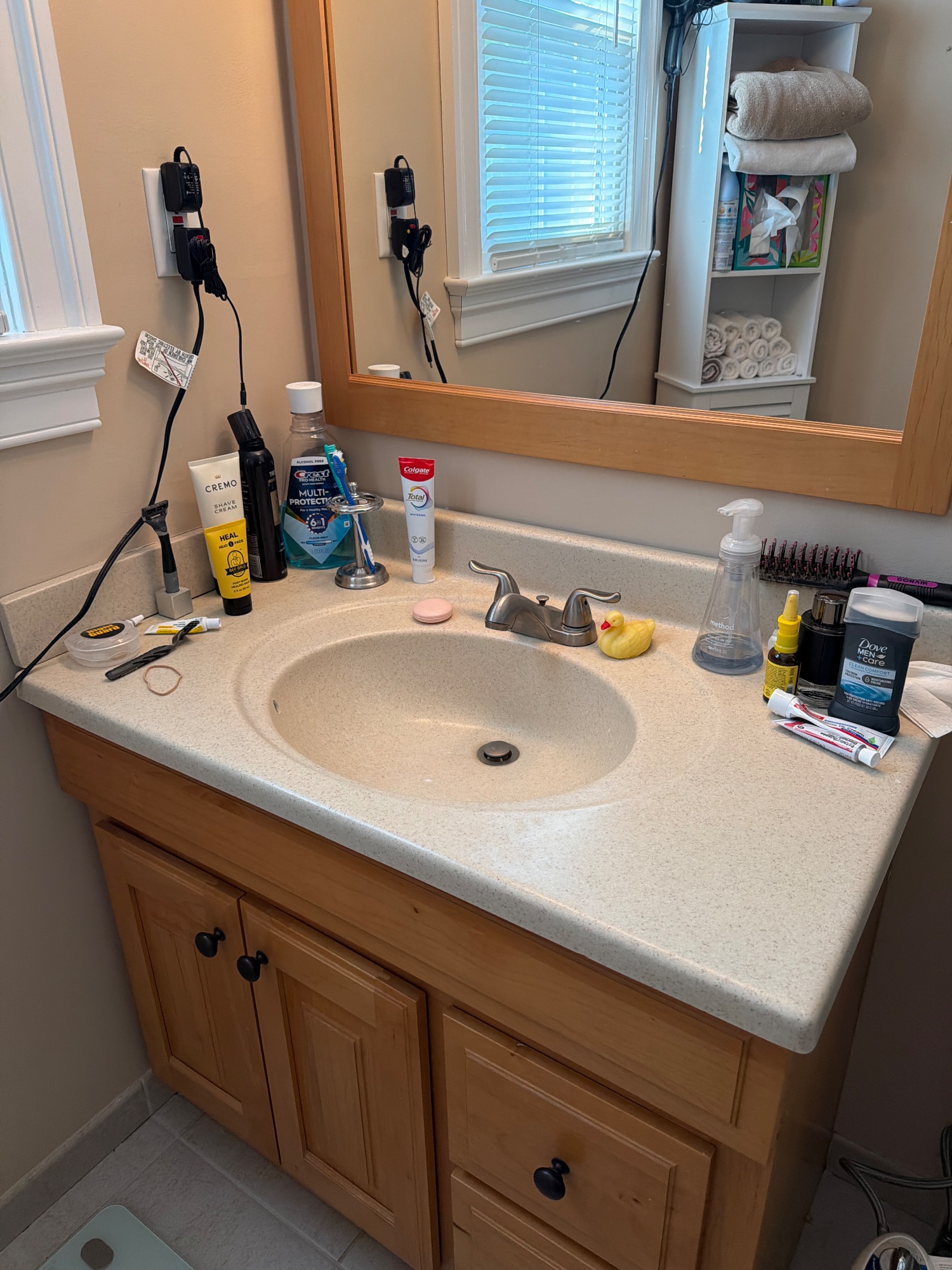The vanity straight on, whole unit and mirror